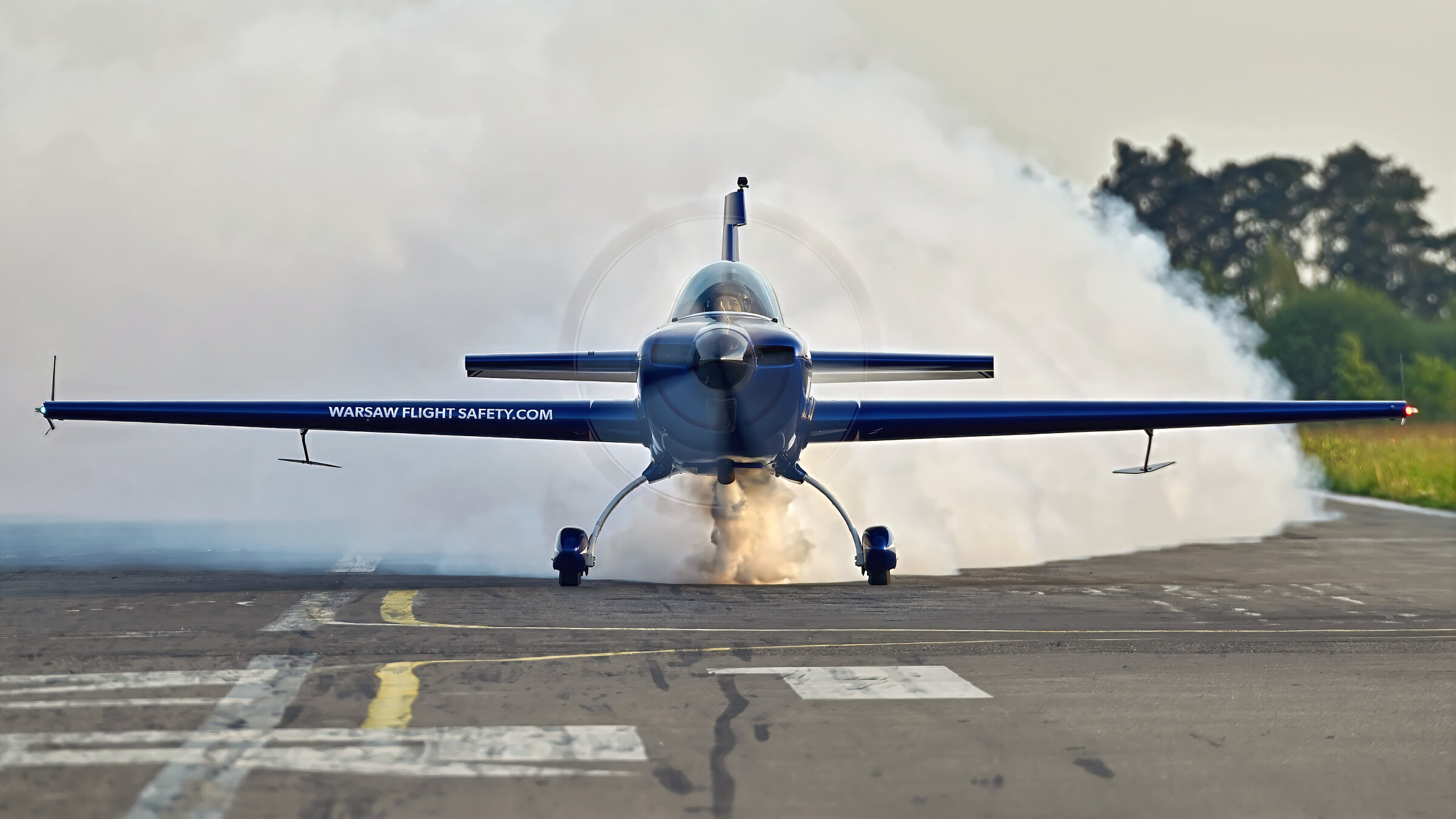 Extra 300L SP-EKS over the landscape