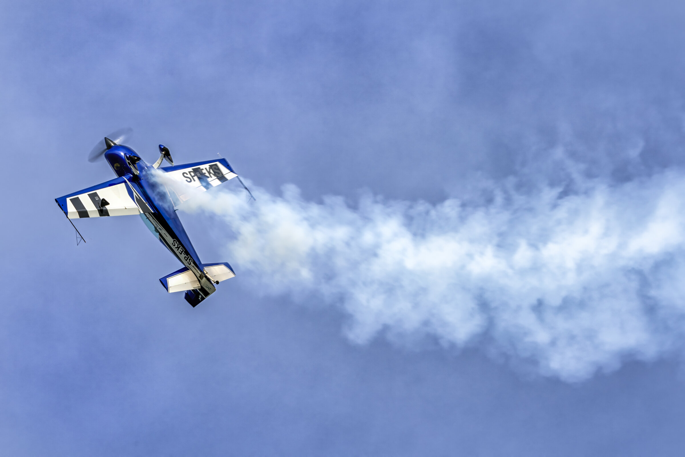 Extra 300L SP-EKS over the landscape