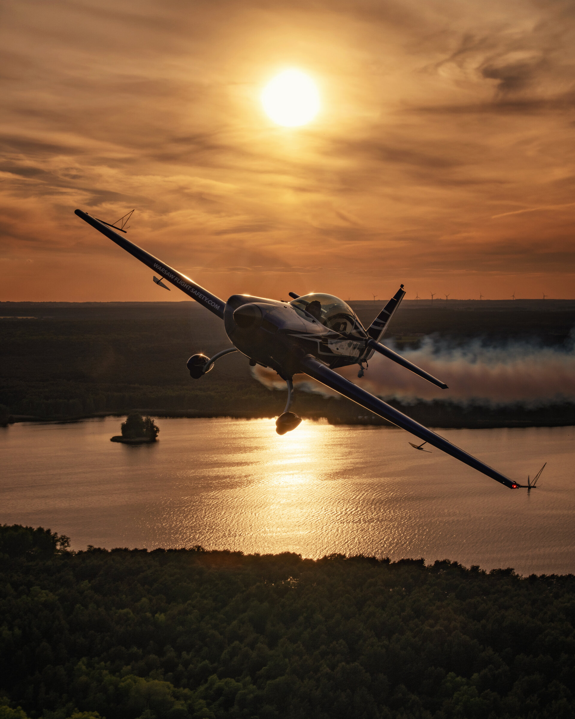 Extra 300L SP-EKS over the landscape