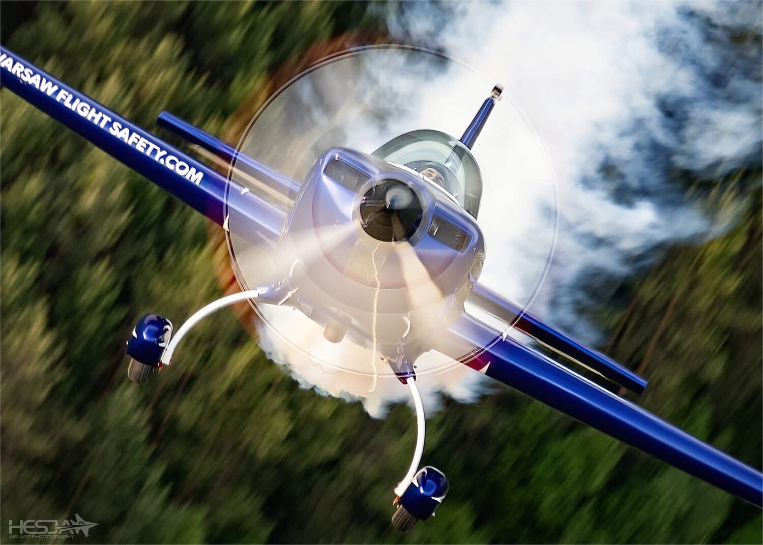 SP-EKS head-on over a forest - prop disc