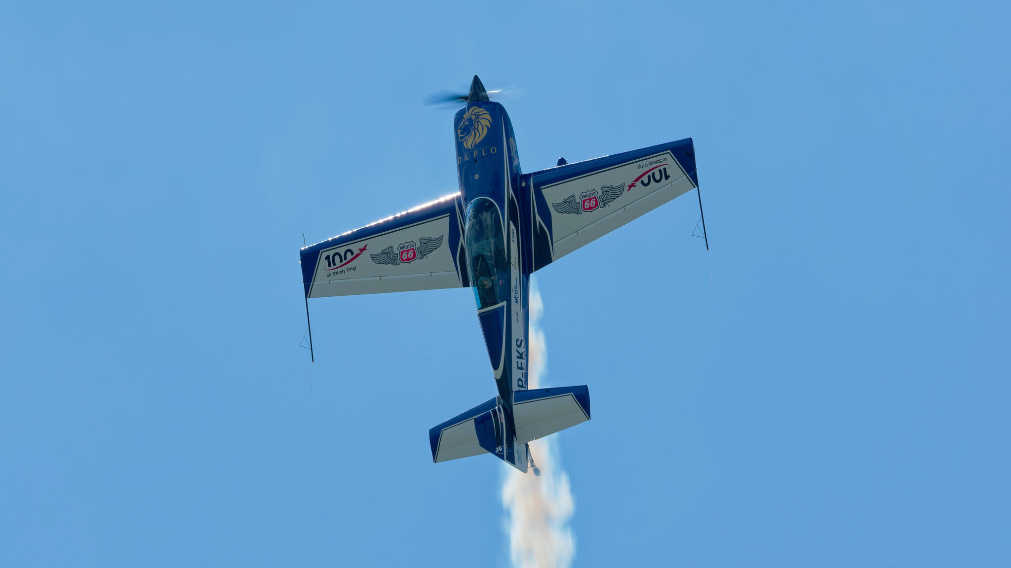 Extra 300L at the top of a figure with smoke, seen from below