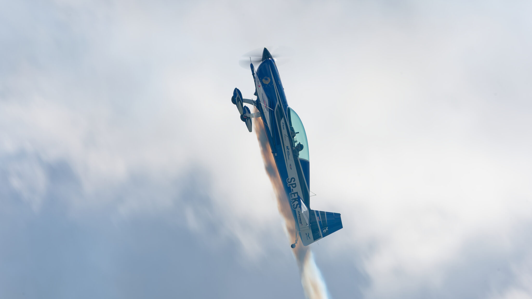 SP-EKS emerging from a cloud in inverted flight