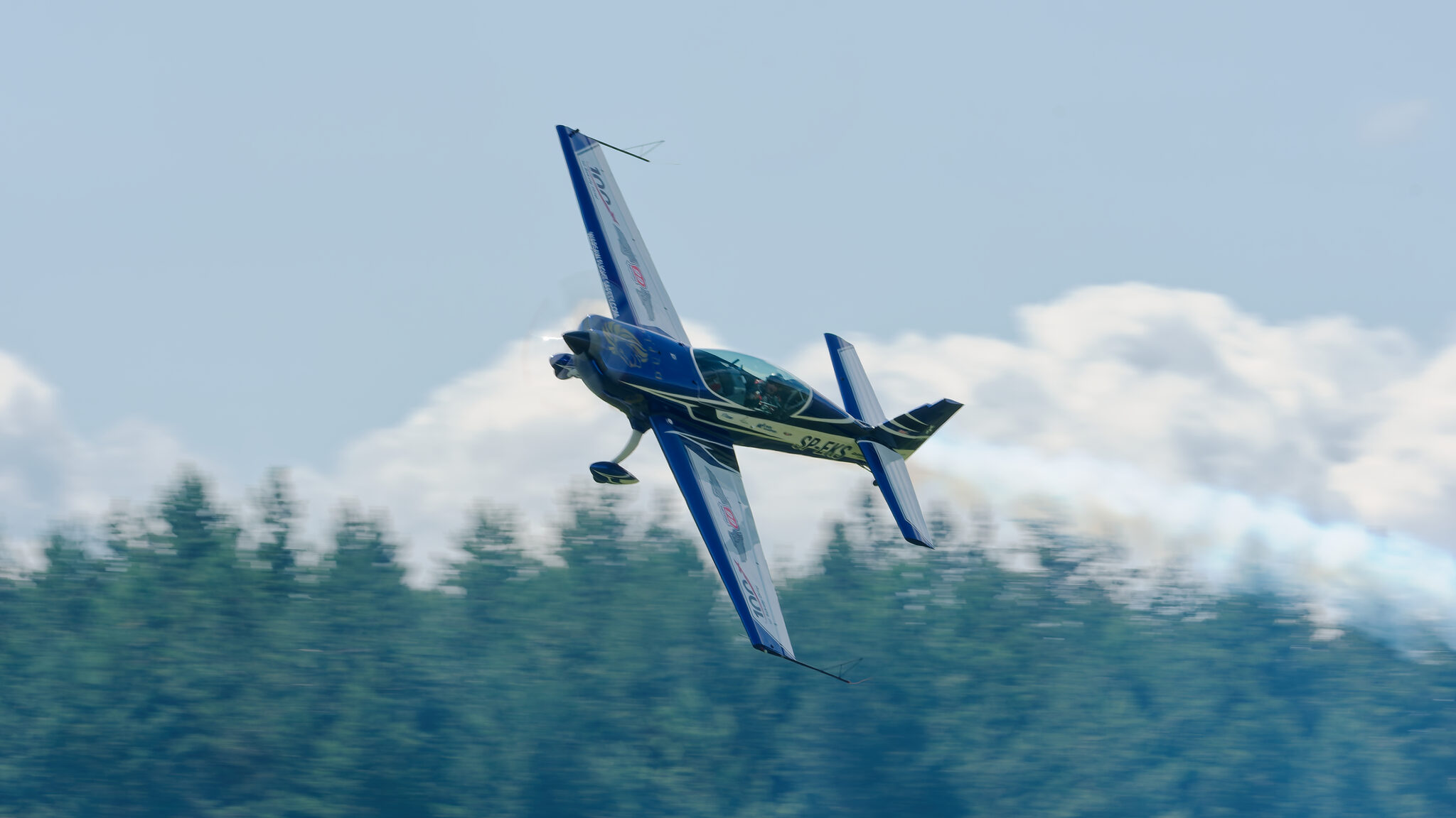 SP-EKS pass with smoke above the tree line
